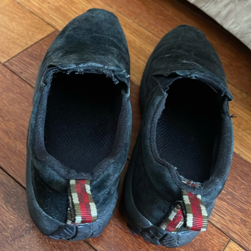 One pair of Abeo flats that are waterproof and slightly worn